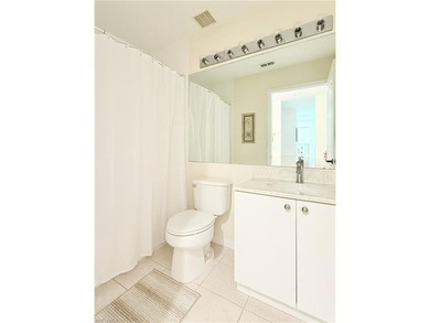 Hard-to-find FIRST-FLOOR 2BR + DEN / 2BA Veranda with garage in on Naples Heritage Golf and Country Club in Florida - for sale on GolfHomes.com, golf home, golf lot