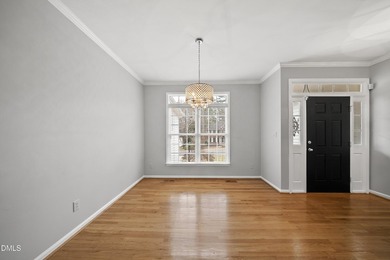 This beautifully updated 5-bedroom, 3-bathroom home offers a on The Neuse Golf Club in North Carolina - for sale on GolfHomes.com, golf home, golf lot