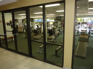 Stunning 1 bed, 1.5 bath, 1st-floor unit in 55+ community! on Sunrise Lakes Phase IV Golf Course in Florida - for sale on GolfHomes.com, golf home, golf lot