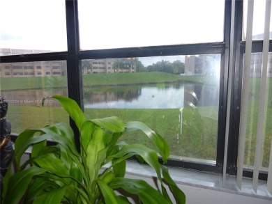 Stunning 1 bed, 1.5 bath, 1st-floor unit in 55+ community! on Sunrise Lakes Phase IV Golf Course in Florida - for sale on GolfHomes.com, golf home, golf lot