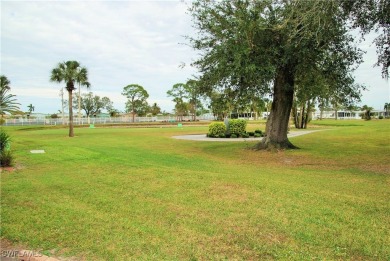 Enjoy stunning golf course views from this beautifully updated on Six Lakes Country Club in Florida - for sale on GolfHomes.com, golf home, golf lot