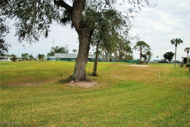 Enjoy stunning golf course views from this beautifully updated on Six Lakes Country Club in Florida - for sale on GolfHomes.com, golf home, golf lot