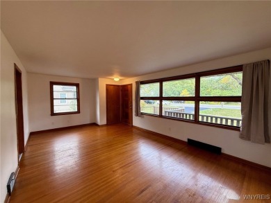 Welcome to this well-maintained 4-bedroom, 2-bath brick Ranch on Seneca Hickory Stick Golf Course in New York - for sale on GolfHomes.com, golf home, golf lot