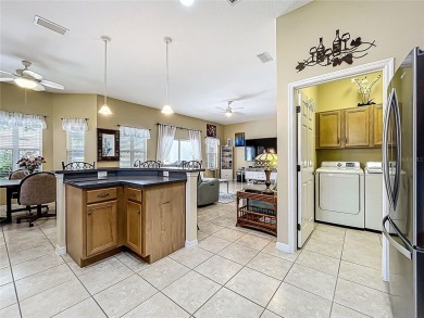 Under contract-accepting backup offers. This custom home on Plantation Golf Club in Florida - for sale on GolfHomes.com, golf home, golf lot