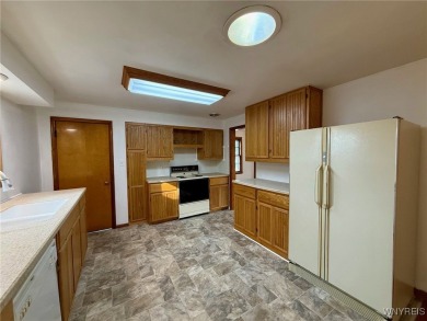 Welcome to this well-maintained 4-bedroom, 2-bath brick Ranch on Seneca Hickory Stick Golf Course in New York - for sale on GolfHomes.com, golf home, golf lot