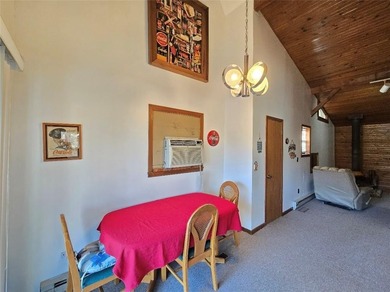 Sugar Valley Lakefront Getaway sits on double lots #79 & #80 on Sugar Valley Lakes Golf Course in Kansas - for sale on GolfHomes.com, golf home, golf lot