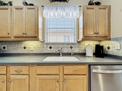 Under contract-accepting backup offers. This custom home on Plantation Golf Club in Florida - for sale on GolfHomes.com, golf home, golf lot