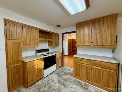 Welcome to this well-maintained 4-bedroom, 2-bath brick Ranch on Seneca Hickory Stick Golf Course in New York - for sale on GolfHomes.com, golf home, golf lot