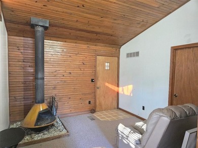 Sugar Valley Lakefront Getaway sits on double lots #79 & #80 on Sugar Valley Lakes Golf Course in Kansas - for sale on GolfHomes.com, golf home, golf lot