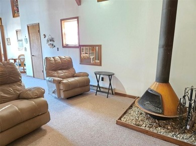 Sugar Valley Lakefront Getaway sits on double lots #79 & #80 on Sugar Valley Lakes Golf Course in Kansas - for sale on GolfHomes.com, golf home, golf lot