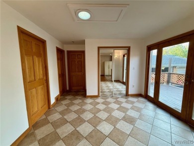 Welcome to this well-maintained 4-bedroom, 2-bath brick Ranch on Seneca Hickory Stick Golf Course in New York - for sale on GolfHomes.com, golf home, golf lot