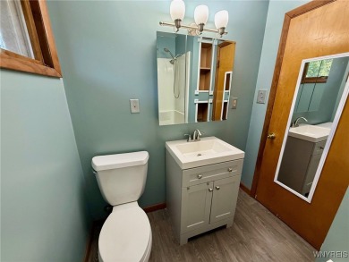 Welcome to this well-maintained 4-bedroom, 2-bath brick Ranch on Seneca Hickory Stick Golf Course in New York - for sale on GolfHomes.com, golf home, golf lot