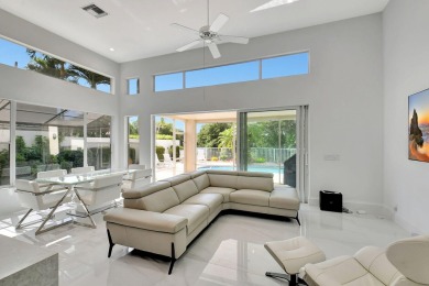 What a spectacular 3 bedroom 4 bath contemporary remodeled home on Broken Sound Golf and Club  in Florida - for sale on GolfHomes.com, golf home, golf lot