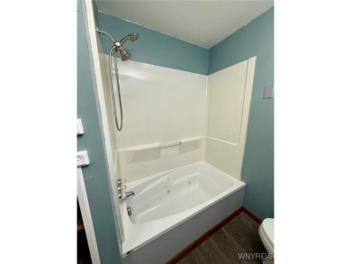 Welcome to this well-maintained 4-bedroom, 2-bath brick Ranch on Seneca Hickory Stick Golf Course in New York - for sale on GolfHomes.com, golf home, golf lot