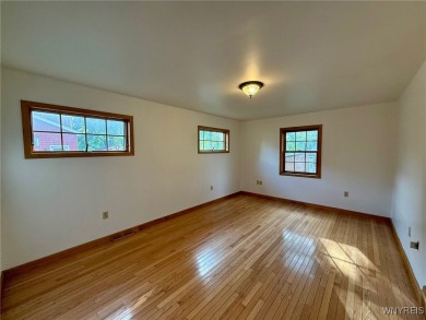 Welcome to this well-maintained 4-bedroom, 2-bath brick Ranch on Seneca Hickory Stick Golf Course in New York - for sale on GolfHomes.com, golf home, golf lot
