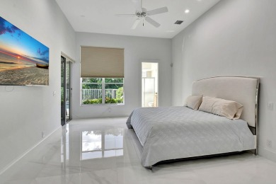 What a spectacular 3 bedroom 4 bath contemporary remodeled home on Broken Sound Golf and Club  in Florida - for sale on GolfHomes.com, golf home, golf lot