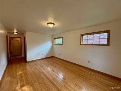 Welcome to this well-maintained 4-bedroom, 2-bath brick Ranch on Seneca Hickory Stick Golf Course in New York - for sale on GolfHomes.com, golf home, golf lot