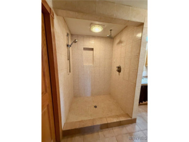 Welcome to this well-maintained 4-bedroom, 2-bath brick Ranch on Seneca Hickory Stick Golf Course in New York - for sale on GolfHomes.com, golf home, golf lot