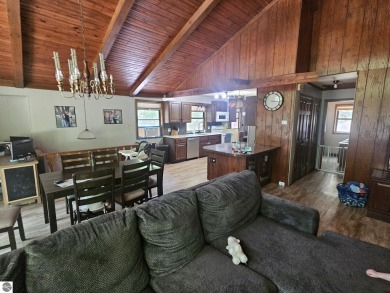 Located in Canadian Lakes Development with access to 11 private on Canadian Lakes Country Club-The Highlands Course in Michigan - for sale on GolfHomes.com, golf home, golf lot