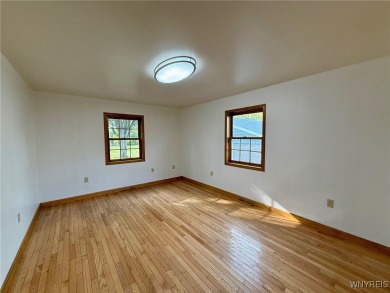 Welcome to this well-maintained 4-bedroom, 2-bath brick Ranch on Seneca Hickory Stick Golf Course in New York - for sale on GolfHomes.com, golf home, golf lot