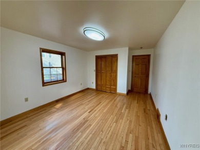 Welcome to this well-maintained 4-bedroom, 2-bath brick Ranch on Seneca Hickory Stick Golf Course in New York - for sale on GolfHomes.com, golf home, golf lot
