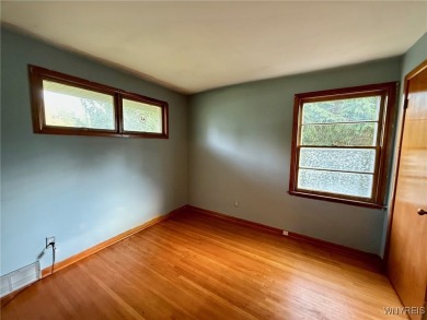 Welcome to this well-maintained 4-bedroom, 2-bath brick Ranch on Seneca Hickory Stick Golf Course in New York - for sale on GolfHomes.com, golf home, golf lot