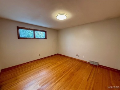 Welcome to this well-maintained 4-bedroom, 2-bath brick Ranch on Seneca Hickory Stick Golf Course in New York - for sale on GolfHomes.com, golf home, golf lot