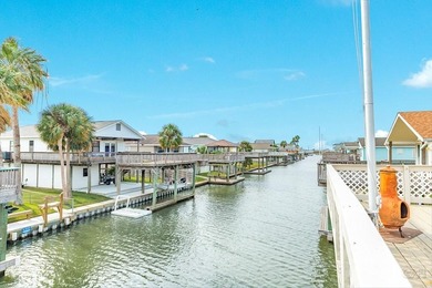 CHARMING THREE-BEDROOM CANAL HOME IN JAMAICA BEACH has a on Galveston Country Club in Texas - for sale on GolfHomes.com, golf home, golf lot