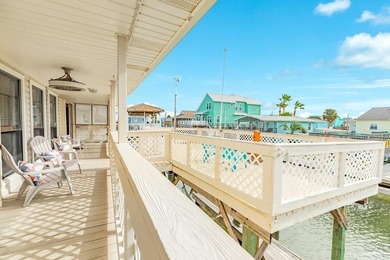 CHARMING THREE-BEDROOM CANAL HOME IN JAMAICA BEACH has a on Galveston Country Club in Texas - for sale on GolfHomes.com, golf home, golf lot