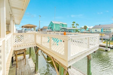 CHARMING THREE-BEDROOM CANAL HOME IN JAMAICA BEACH has a on Galveston Country Club in Texas - for sale on GolfHomes.com, golf home, golf lot