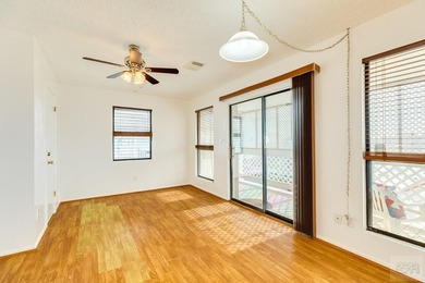 CHARMING THREE-BEDROOM CANAL HOME IN JAMAICA BEACH has a on Galveston Country Club in Texas - for sale on GolfHomes.com, golf home, golf lot