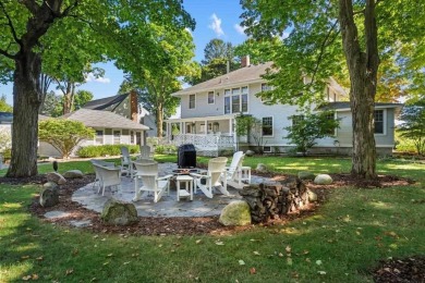 Offering turn-of-the-century charm, this historic Charlevoix on Charlevoix Golf Club in Michigan - for sale on GolfHomes.com, golf home, golf lot