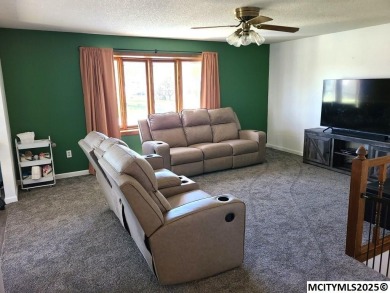 Great 3 bedroom, 1.5 bath split level home with an attached 2 on Linn Grove Country Club in Iowa - for sale on GolfHomes.com, golf home, golf lot