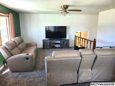 Great 3 bedroom, 1.5 bath split level home with an attached 2 on Linn Grove Country Club in Iowa - for sale on GolfHomes.com, golf home, golf lot
