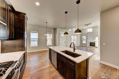 The Duxbury by Landmark Homes offers ranch-style living + a on Highland Meadows Golf Course in Colorado - for sale on GolfHomes.com, golf home, golf lot