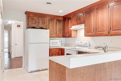 Welcome to your private two bedroom, two bath contemporary oasis on Brandermill Country Club in Virginia - for sale on GolfHomes.com, golf home, golf lot