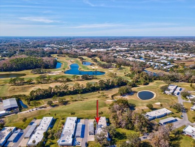 Completely updated, luxurious unit located within the gates of on Seven Springs Golf and Country Club in Florida - for sale on GolfHomes.com, golf home, golf lot