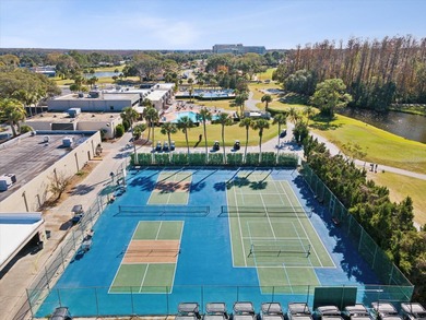 Completely updated, luxurious unit located within the gates of on Seven Springs Golf and Country Club in Florida - for sale on GolfHomes.com, golf home, golf lot