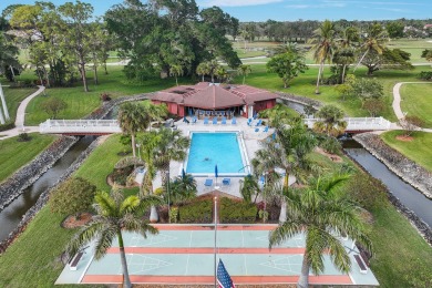 Looking for a lovely, updated condominium with a Structure on Hibiscus Golf Club in Florida - for sale on GolfHomes.com, golf home, golf lot