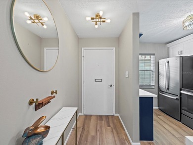 Completely updated, luxurious unit located within the gates of on Seven Springs Golf and Country Club in Florida - for sale on GolfHomes.com, golf home, golf lot