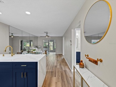 Completely updated, luxurious unit located within the gates of on Seven Springs Golf and Country Club in Florida - for sale on GolfHomes.com, golf home, golf lot