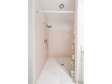 Welcome to your private two bedroom, two bath contemporary oasis on Brandermill Country Club in Virginia - for sale on GolfHomes.com, golf home, golf lot