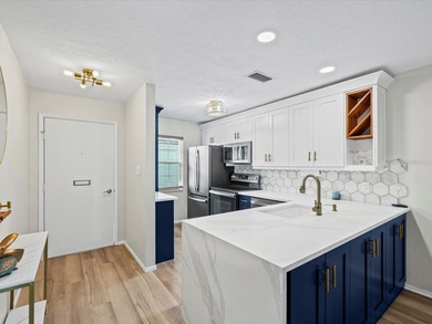 Completely updated, luxurious unit located within the gates of on Seven Springs Golf and Country Club in Florida - for sale on GolfHomes.com, golf home, golf lot