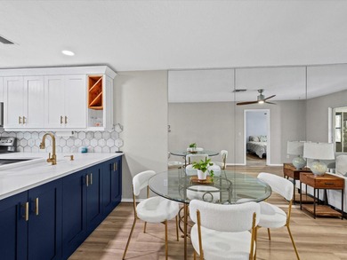 Completely updated, luxurious unit located within the gates of on Seven Springs Golf and Country Club in Florida - for sale on GolfHomes.com, golf home, golf lot