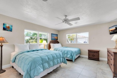 A beautifully upgraded waterfront home in Marathon's desirable on Sombrero Golf and Country Club in Florida - for sale on GolfHomes.com, golf home, golf lot