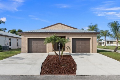 Discover the epitome of comfortable living in this 2019 CBS on Spanish Lakes Country Club in Florida - for sale on GolfHomes.com, golf home, golf lot