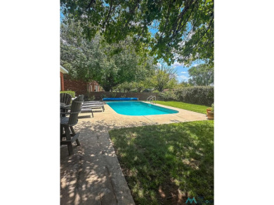 Step into luxury with this stunning two-story, three-bedroom, 2 on Chaparral Country Club in New Mexico - for sale on GolfHomes.com, golf home, golf lot