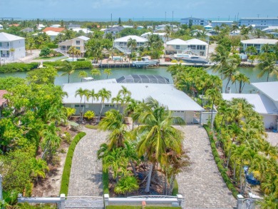 A beautifully upgraded waterfront home in Marathon's desirable on Sombrero Golf and Country Club in Florida - for sale on GolfHomes.com, golf home, golf lot