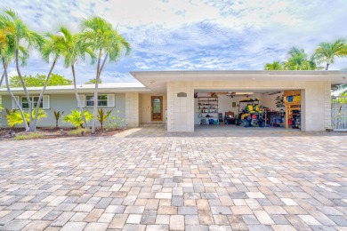 A beautifully upgraded waterfront home in Marathon's desirable on Sombrero Golf and Country Club in Florida - for sale on GolfHomes.com, golf home, golf lot