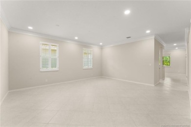 Discover the perfect blend of comfort, style, and location at on Eagle Marsh Golf Club in Florida - for sale on GolfHomes.com, golf home, golf lot